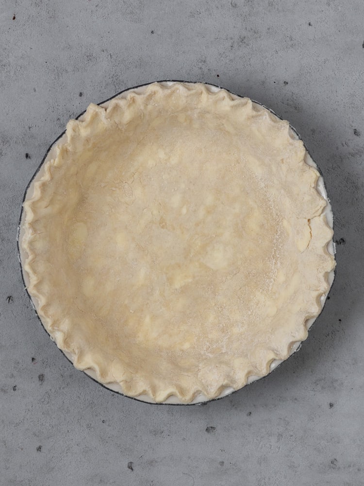Homemade pie crust before being filled