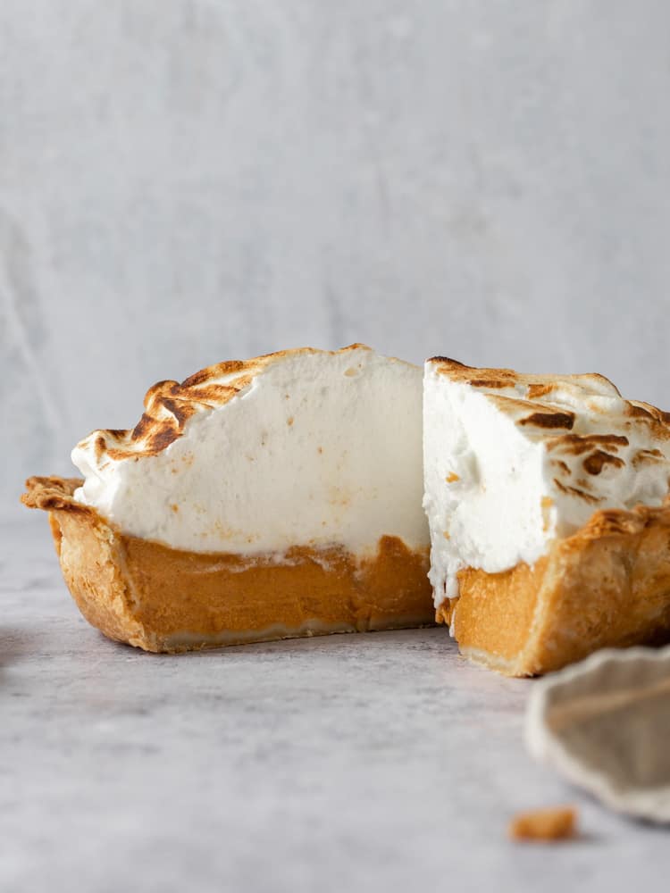 A pumpkin pie piled high with meringue