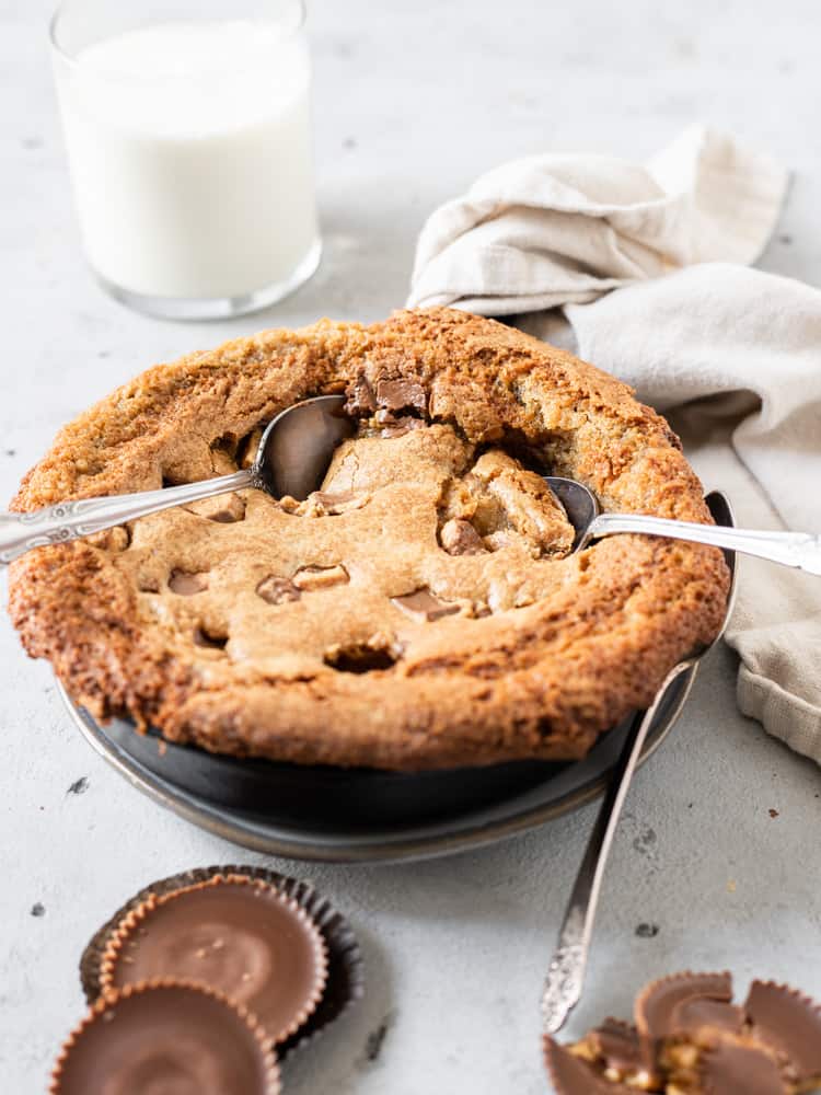 A side shot of a Reese's skillet cookie