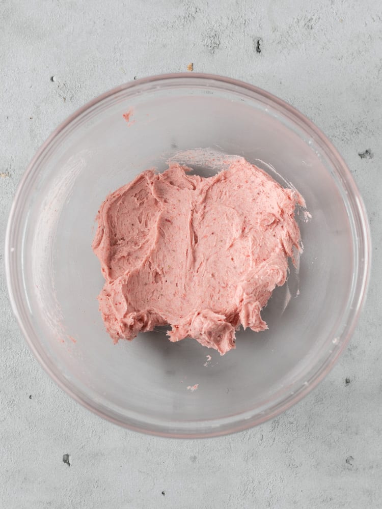 A bowl of strawberry american buttercream
