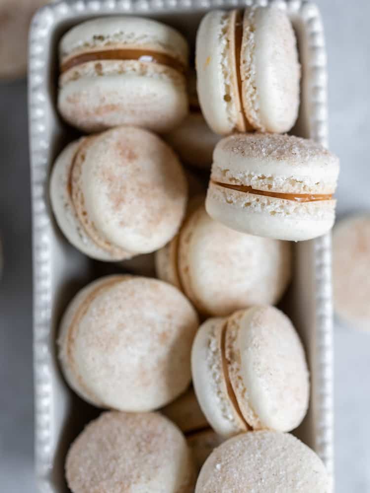 Looking down on a dish of fresh macarons