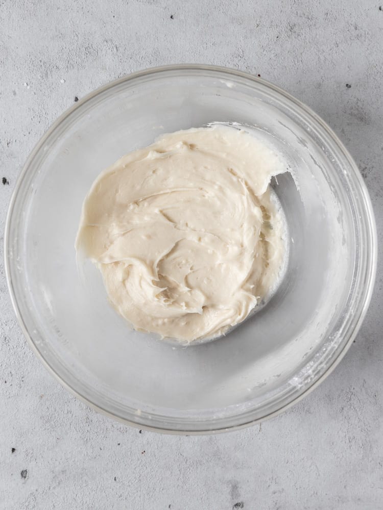 The cream cheese buttercream in a bowl