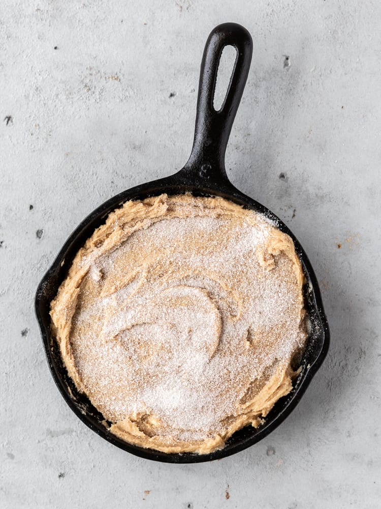 The skillet cookie topped with the cinnamon-sugar topping before being baked