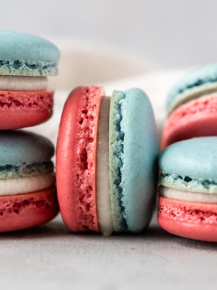 A close up of a red white and blue macaron on its side
