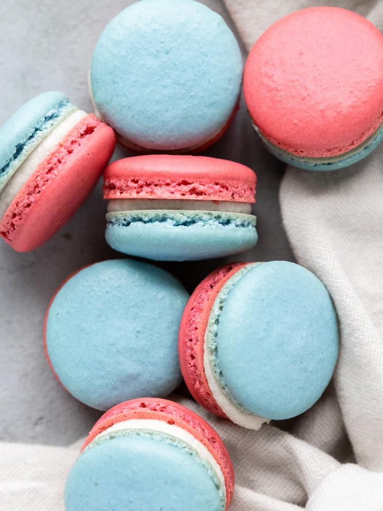 a pile of red white and blue macarons