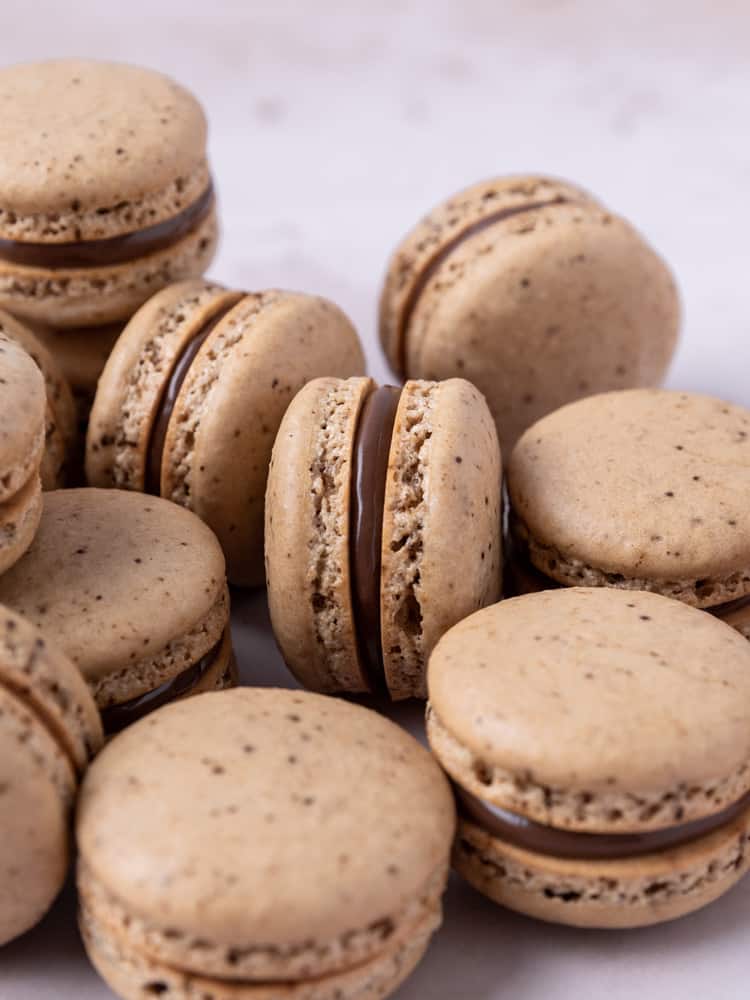 A pile of coffee nutella macarons