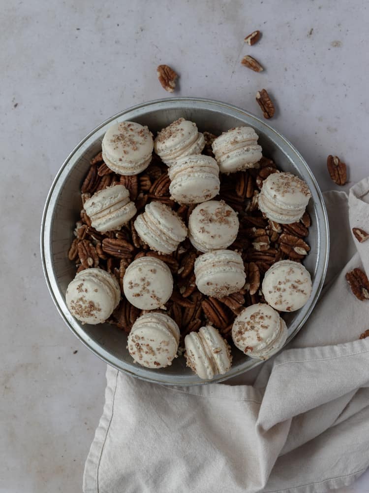 macarons and pecans in a dish