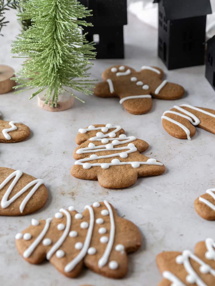 A bunch of gingerbread cookies on a board