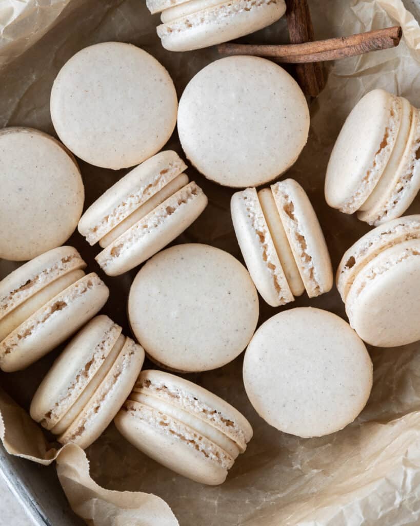 looking down on a dish full of egg nog macarons