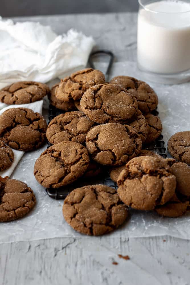 the soft molasses cookies piled on a plate