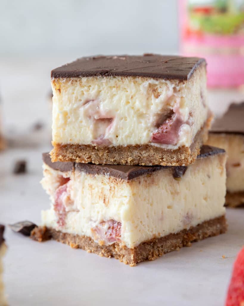two cheesecake bars stacked