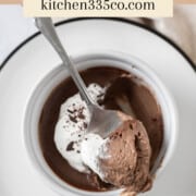 a pots de crème in a ramekin on a white plate. It says chocolate pots de crème across the top