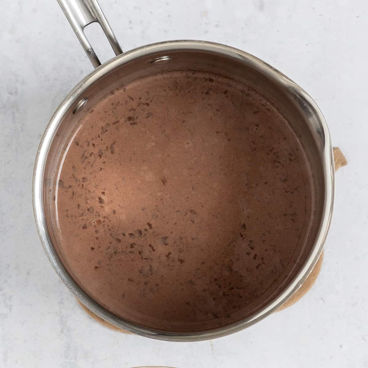 the chocolate, heavy cream, and milk combined in a small saucepan