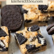 a closeup of an oreo bar on a white background surrounded by other bars and oreos. It says oreo bars across the top