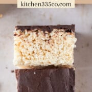 a chocolate covered rice krispie treat on its side leaning on another treat. It says chocolate covered rice krispie treats across the top.