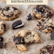 several oreo and chocolate chip cookies on a pan with broken oreos. It says Oreo and Chocolate Chip Cookies across the top.