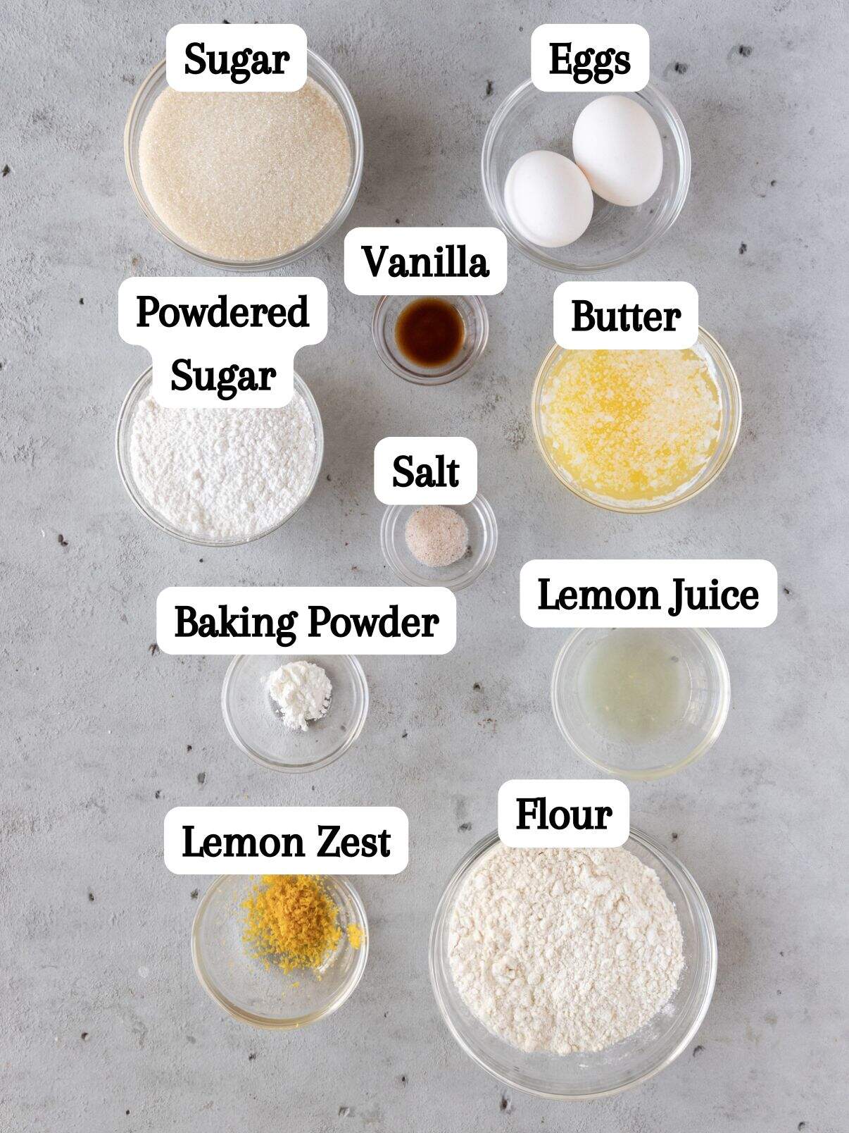 all of the ingredients laid out and labeled on a grey background.
