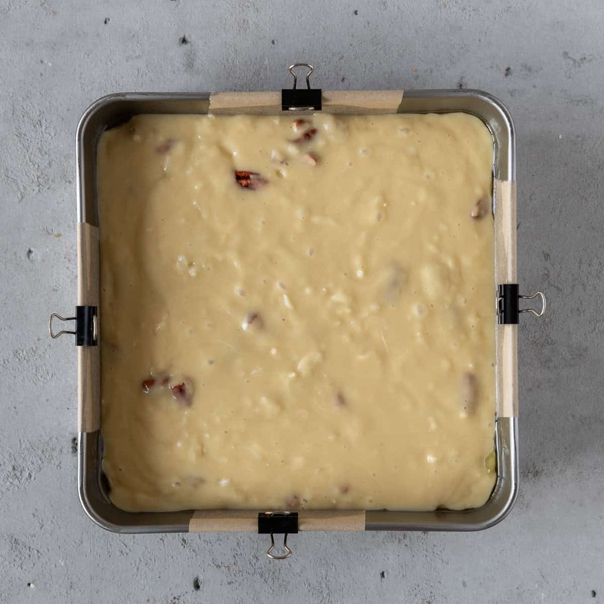 the italian cream cake in a baking dish before being baked.