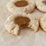 a pumpkin pie cookie with a sugar cookie crust with a bite taken out of it.